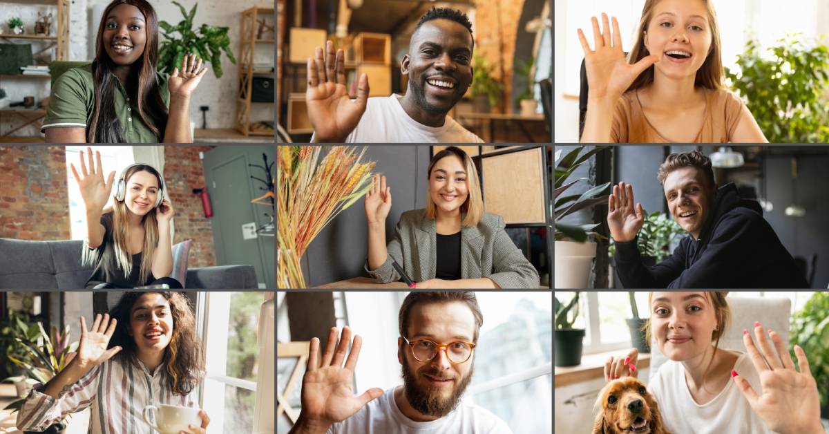 A diverse team of people waving and smiling at the camera during a virtual meeting. There are live video icons at the bottom.